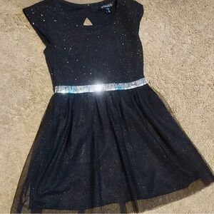Beautiful black dress with silver sequence .Size 4/5 T